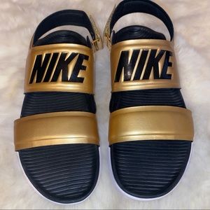 NWOT Nike Gold Tanjun Slides